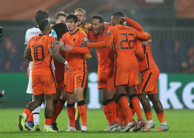 Belanda, negara ke-12 yang lolos ke Piala Dunia 2022. (foto:reuters)